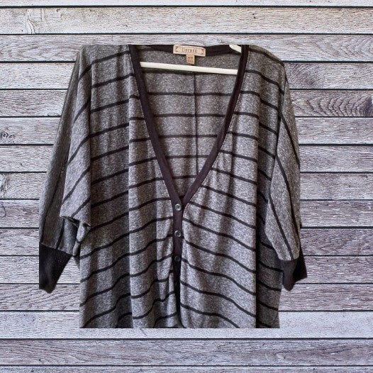 This Decree V-Neck button down top is both comfortable and stylish for any woman