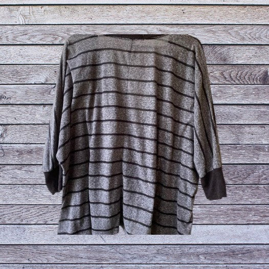 This Decree V-Neck button down top is both comfortable and stylish for any woman