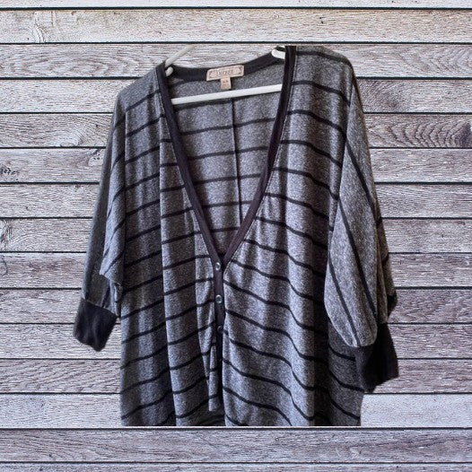 This Decree V-Neck button down top is both comfortable and stylish for any woman