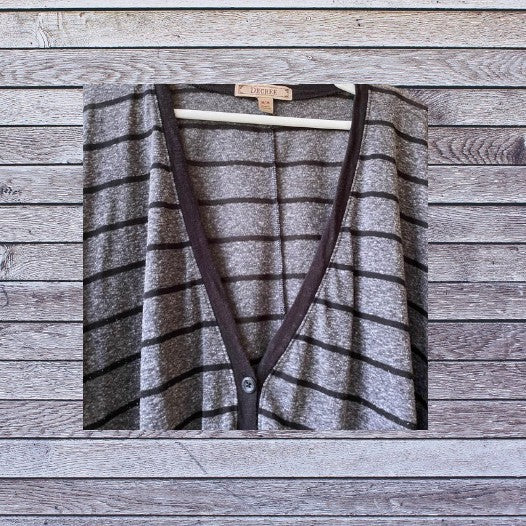 This Decree V-Neck button down top is both comfortable and stylish for any woman