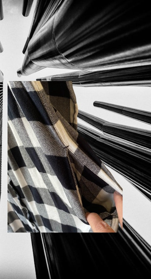 Stay effortlessly chic and comfortable with this Coldwater Creek Rayon Checkered Pattern Dress