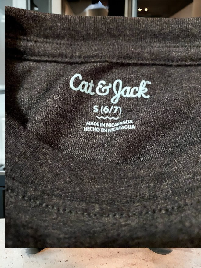 This Cat & Jack black graphic tee is the perfect way to add a touch of inspiration to any girl's wardrobe