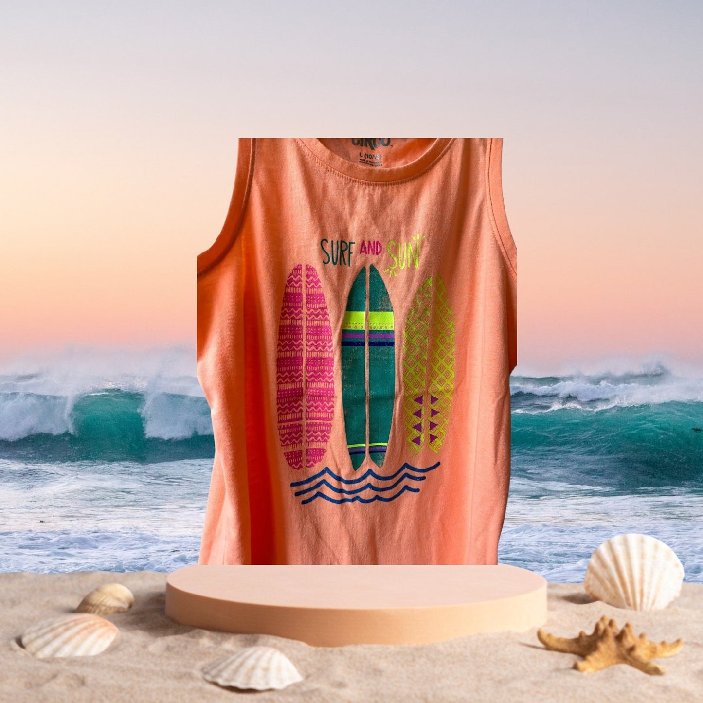 Enjoy the summer in this Circo surf and sun graphic tee tank top for juniors