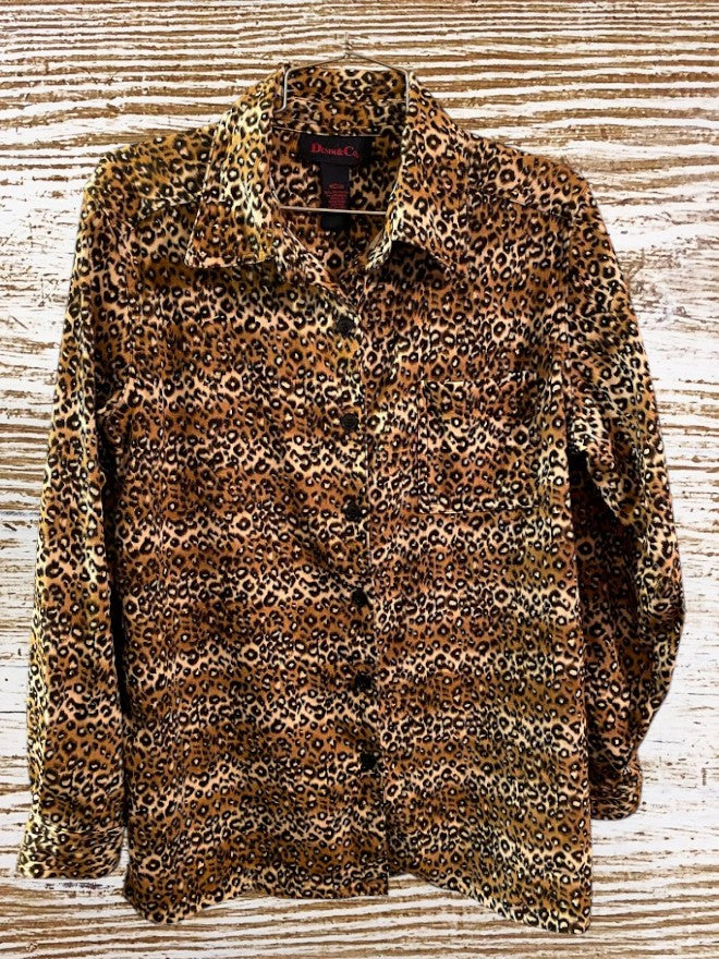 This Denim & Co. button down collar shirt features a striking leopard print design