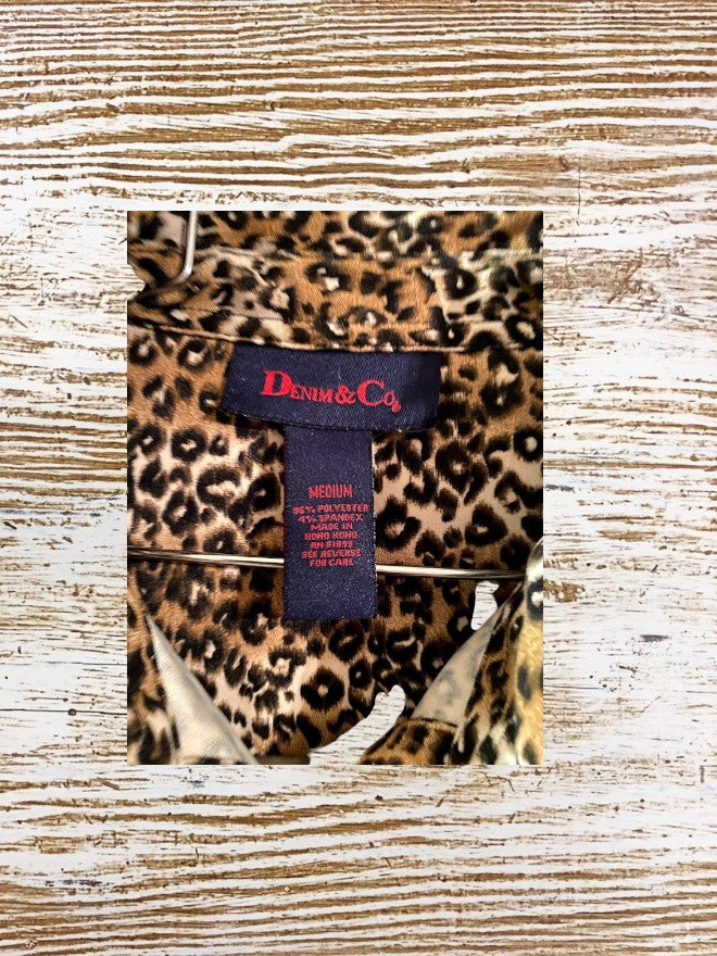 This Denim & Co. button down collar shirt features a striking leopard print design