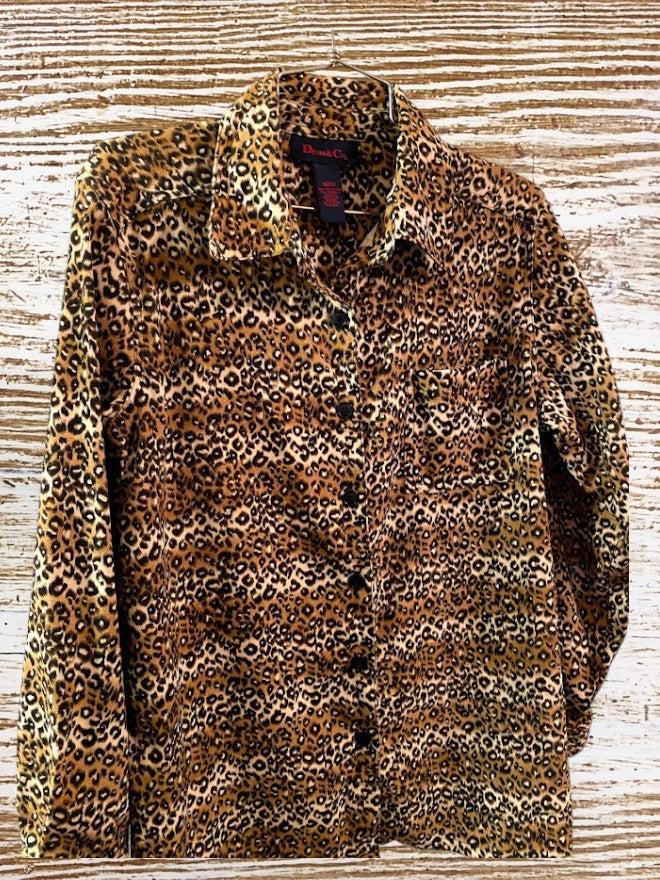 This Denim & Co. button down collar shirt features a striking leopard print design