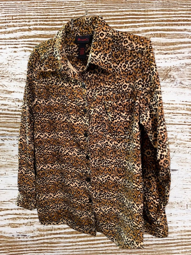 This Denim & Co. button down collar shirt features a striking leopard print design