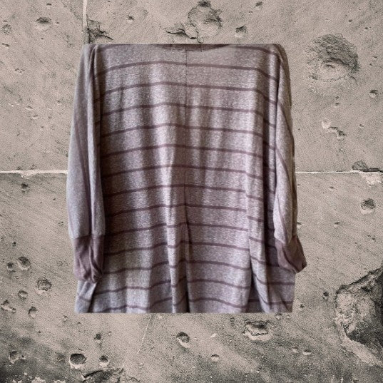 This Decree V-Neck button down top is both comfortable and stylish for any woman