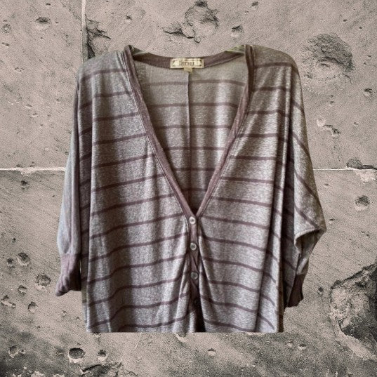This Decree V-Neck button down top is both comfortable and stylish for any woman