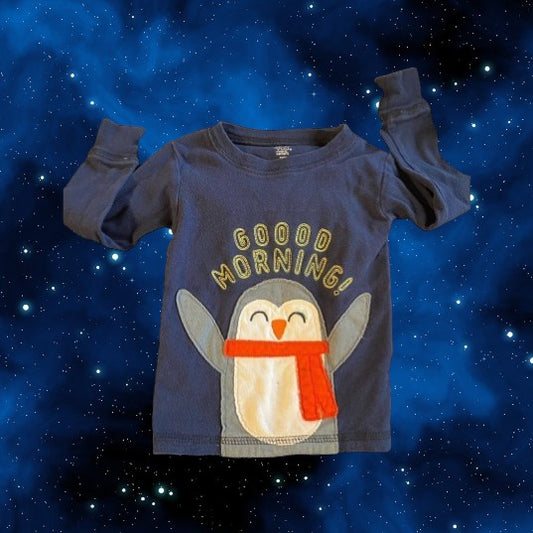 The Carter's Just One You penguin appliqué pajama top, features a playful blue multicolor design