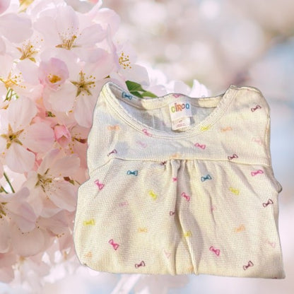 Bring a splash of color to your little one's wardrobe with our Circo vibrant pattern design top