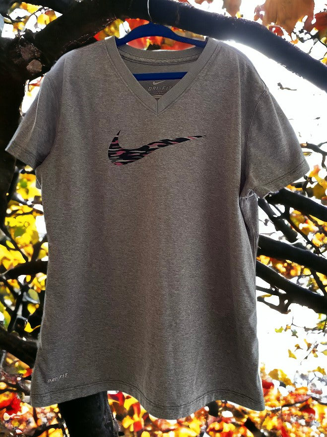 Nike Dri-Fit V-Neck top is incredibly soft, providing a comfortable wear experience.