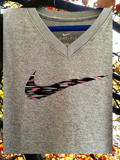 Nike Dri-Fit V-Neck top is incredibly soft, providing a comfortable wear experience.