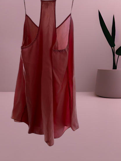 This Kisses silk top is made from 100% silk and offers a luxurious and comfortable fit