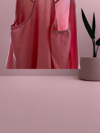 This Kisses silk top is made from 100% silk and offers a luxurious and comfortable fit