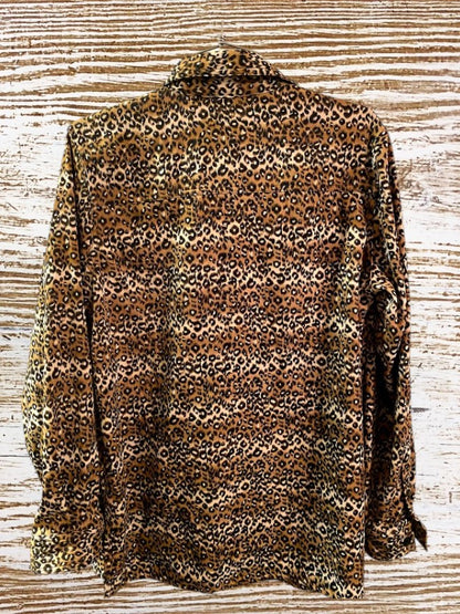 This Denim & Co. button down collar shirt features a striking leopard print design