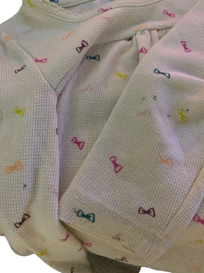 Bring a splash of color to your little one's wardrobe with our Circo vibrant pattern design top