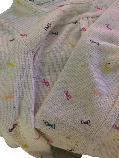 Bring a splash of color to your little one's wardrobe with our Circo vibrant pattern design top