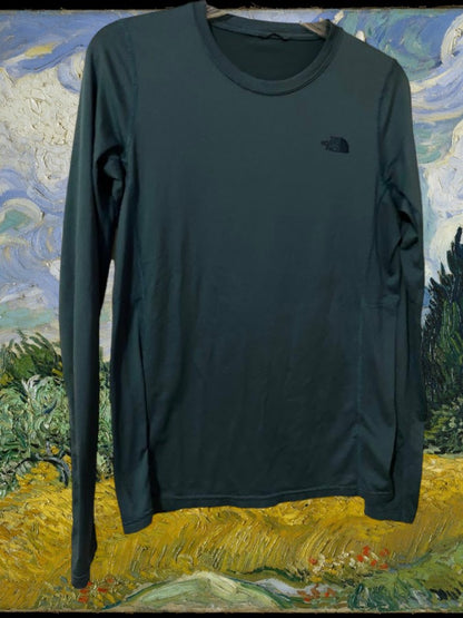 The North Face activewear shirt with raised logo on both the front and back