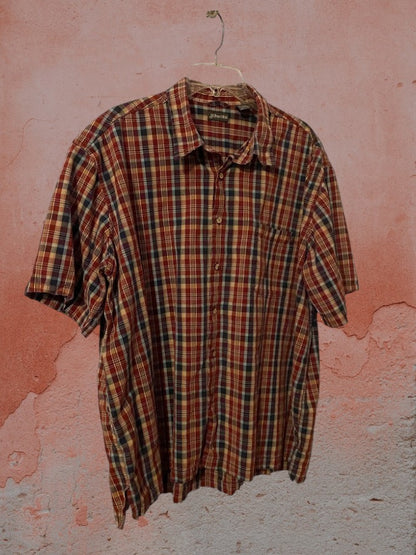 St. John's Bay plaid button down shirt is designed to provide lasting comfort.