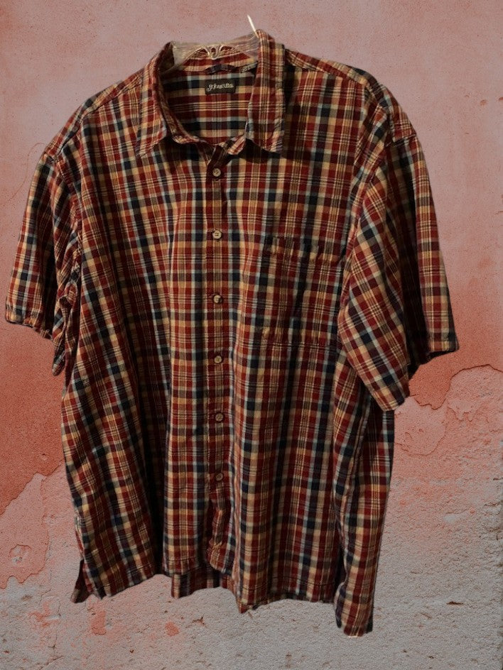 St. John's Bay plaid button down shirt is designed to provide lasting comfort.