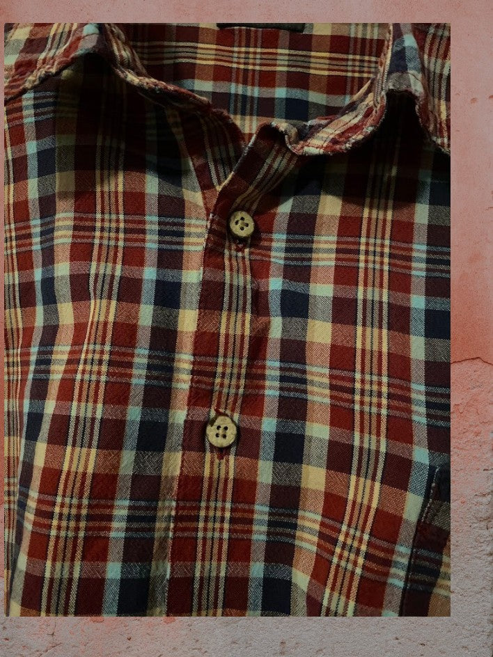 St. John's Bay plaid button down shirt is designed to provide lasting comfort.