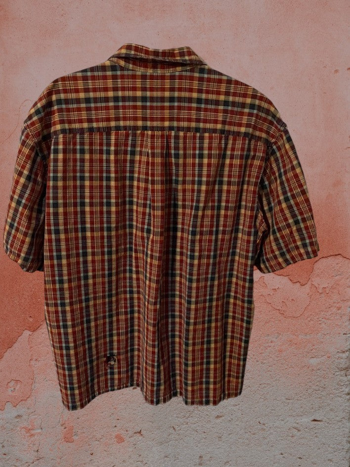 St. John's Bay plaid button down shirt is designed to provide lasting comfort.