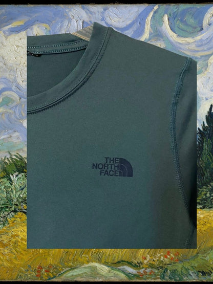 The North Face activewear shirt with raised logo on both the front and back