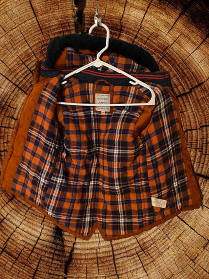 Boy's plaid coat with hood boasts a hi-low, slit design, with a plaid warm full lining