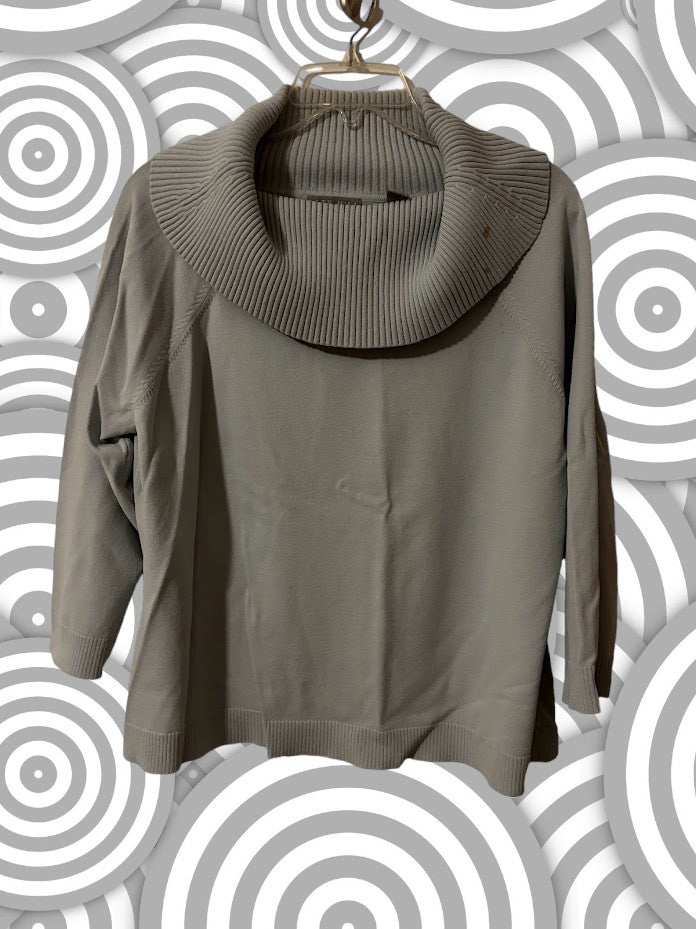 For a chic and comfortable look, try the Kate Hill drop turtleneck blouse