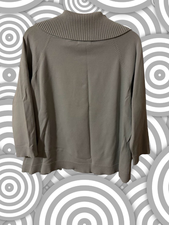 For a chic and comfortable look, try the Kate Hill drop turtleneck blouse