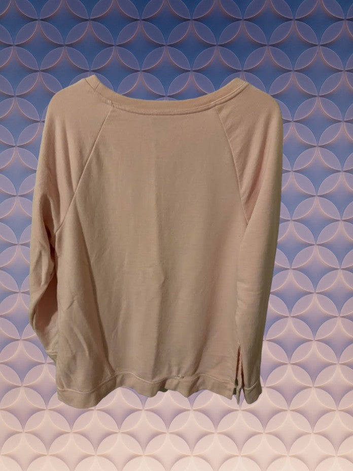 This hi-low sweatshirt is a fashionable and versatile option for comfort