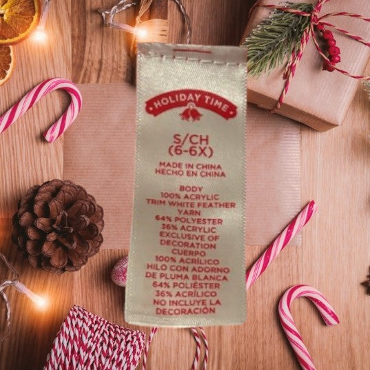 This Holiday Time Christmas dress features a classic stripe design in festive red, white and black