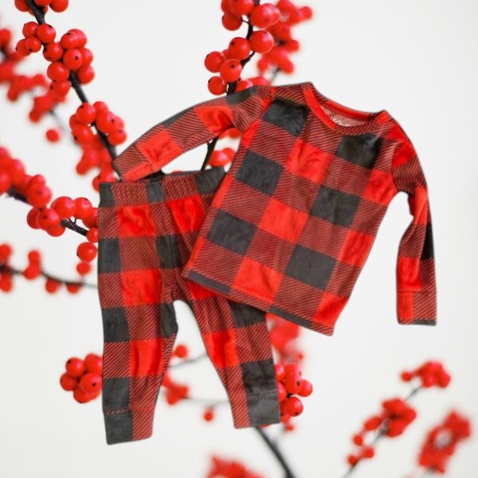 This 2pc pajama set from Cat & Jack features a cool checker design and is made of incredibly soft fabric