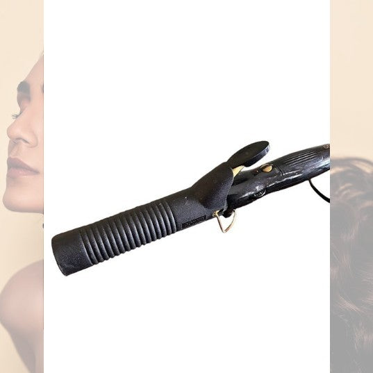 The Conair curling iron features a sturdy stand and protective cover