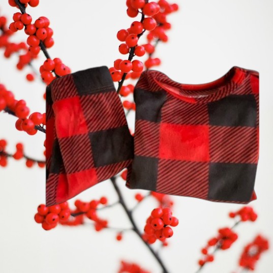This 2pc pajama set from Cat & Jack features a cool checker design and is made of incredibly soft fabric